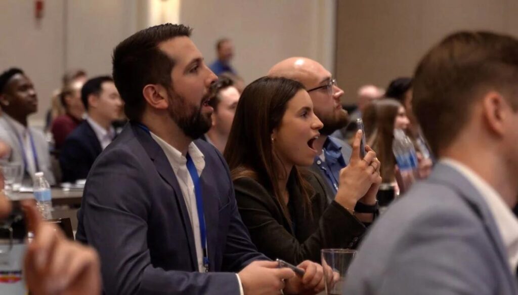 Guests reacting during corporate entertainment in Tinley Park at a business event