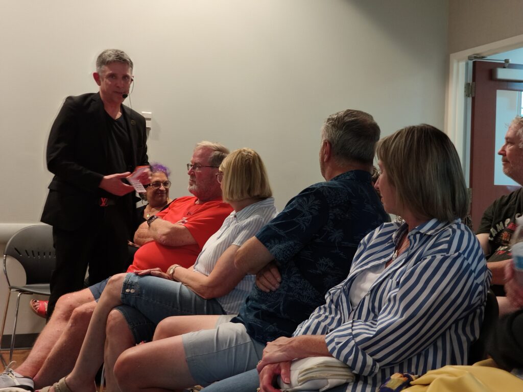 Nick Gasparro performing close-up card magic at Hanover Park Library event