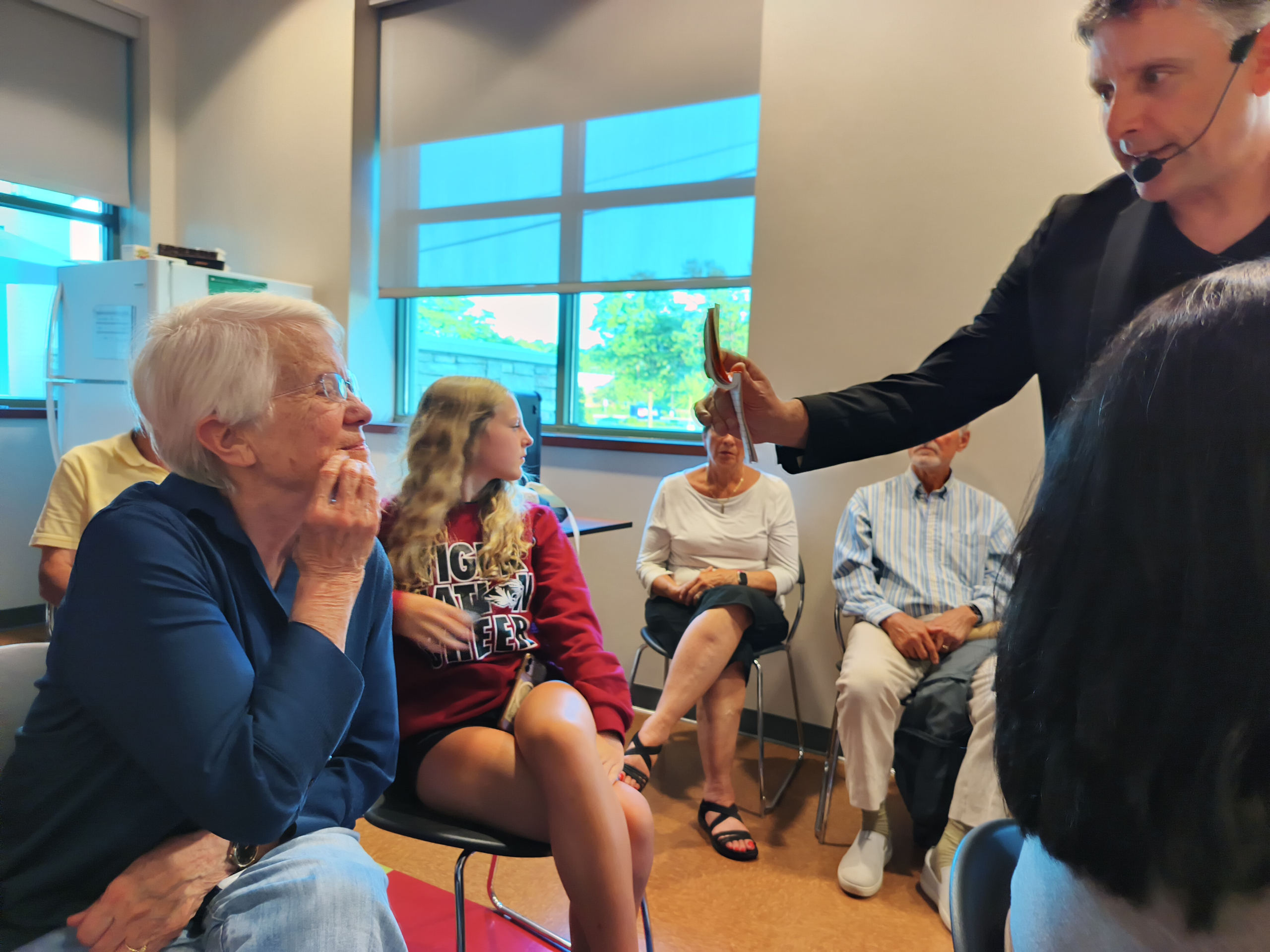 Nick Gasparro performing mentalism for guests at Hanover Park Library magic show